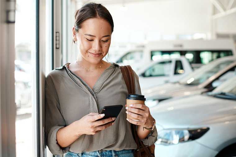 A female holding a phone